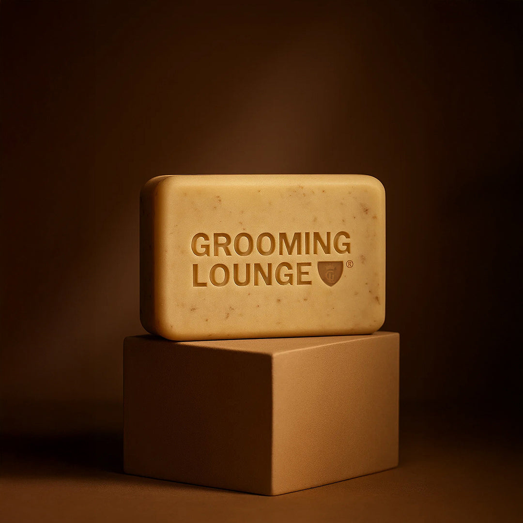 Bar of soap with 'Grooming Lounge' branding on a brown background